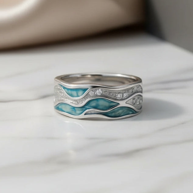 Ring met zilveren golven en turkoois