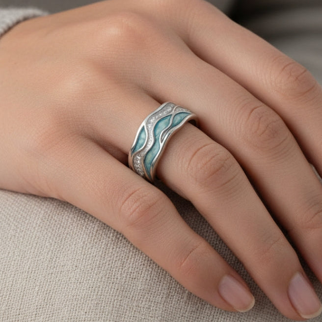 Ring met zilveren golven en turkoois
