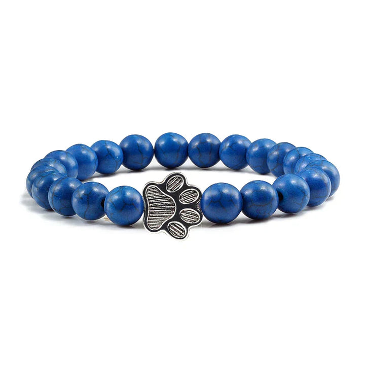 Armband met pootafdrukken versierd met kralen