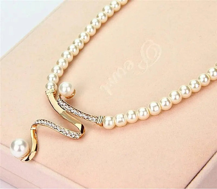 Set collana en oorbellen met natuurlijke parels