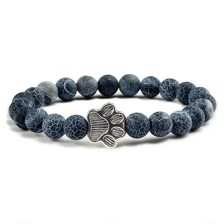 Armband met pootafdrukken versierd met kralen