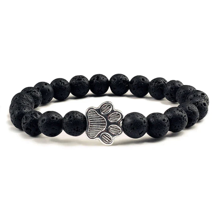 Armband met pootafdrukken versierd met kralen