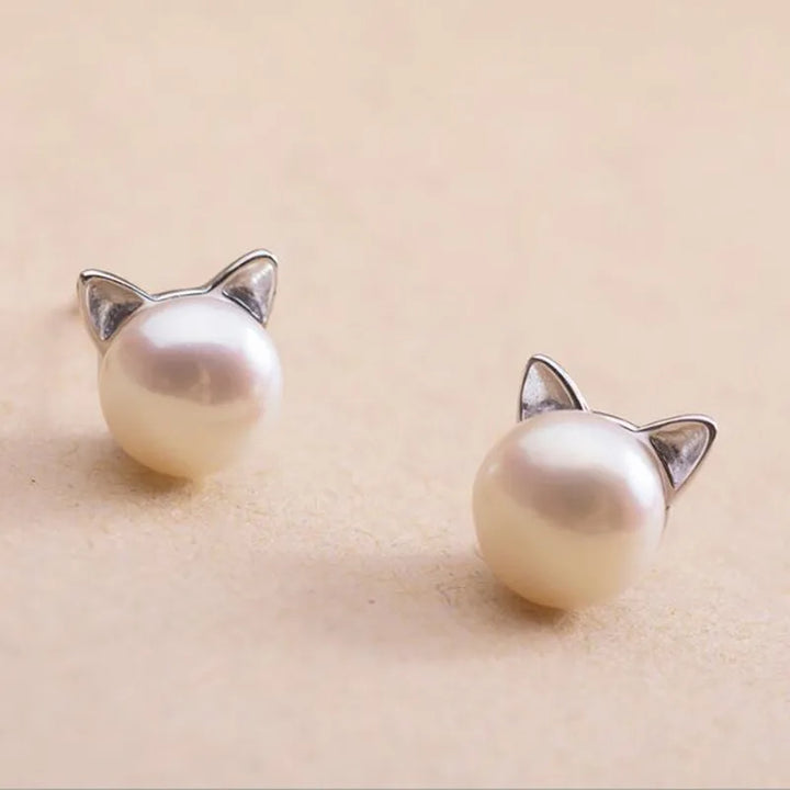 Oorbellen met parel en kattenmotief van sterling zilver