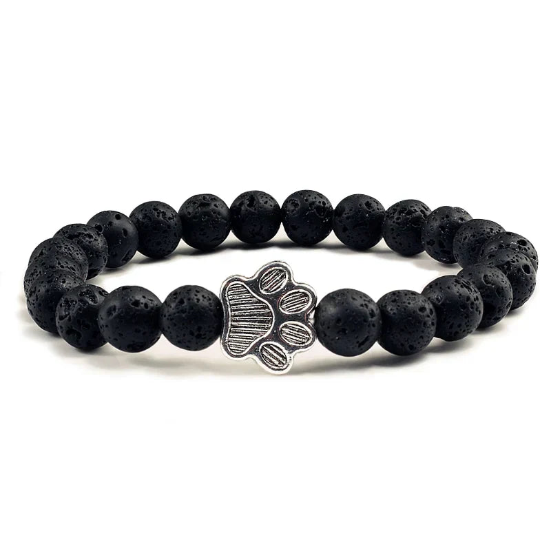 Armband met pootafdrukken versierd met kralen