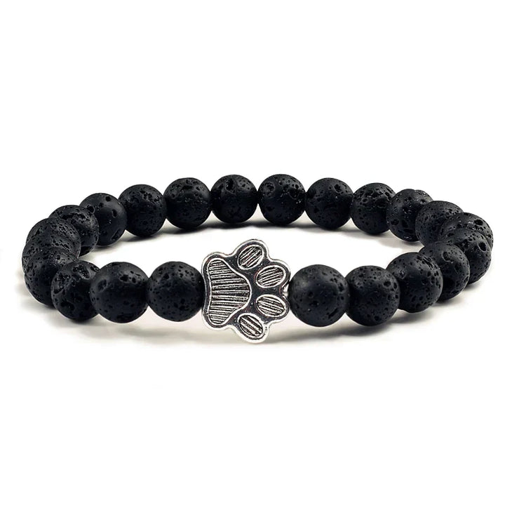 Armband met pootafdrukken versierd met kralen