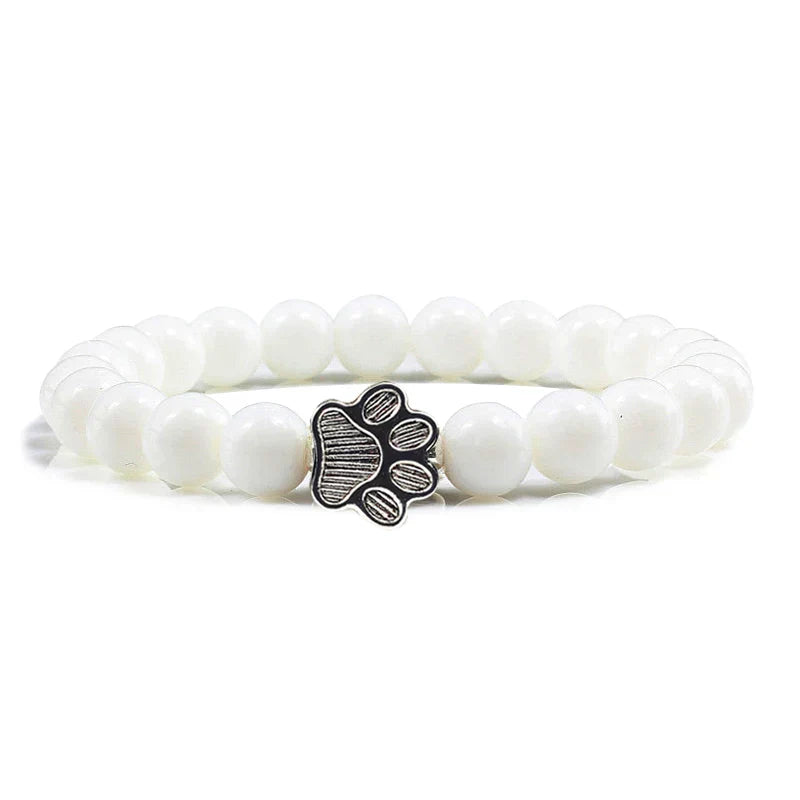 Armband met pootafdrukken versierd met kralen