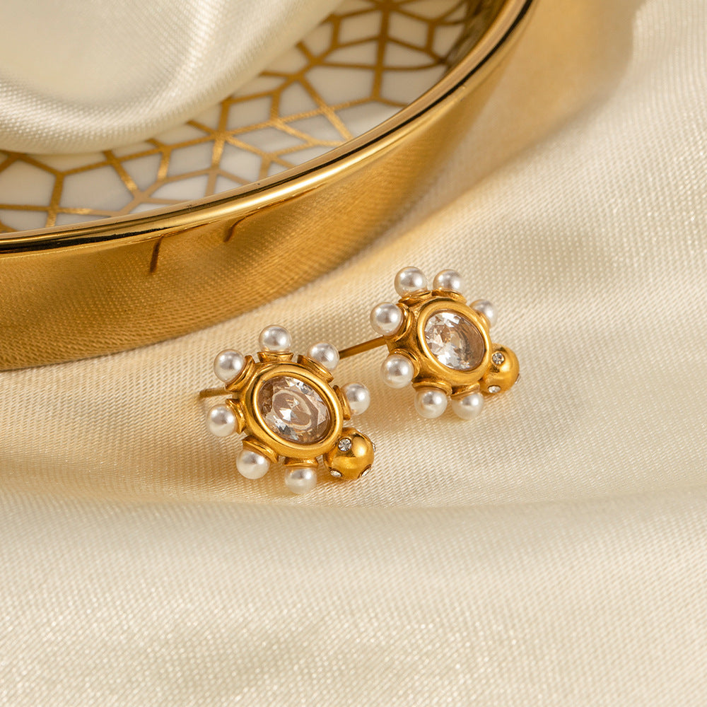 Elegante oorbellen van goud met parel