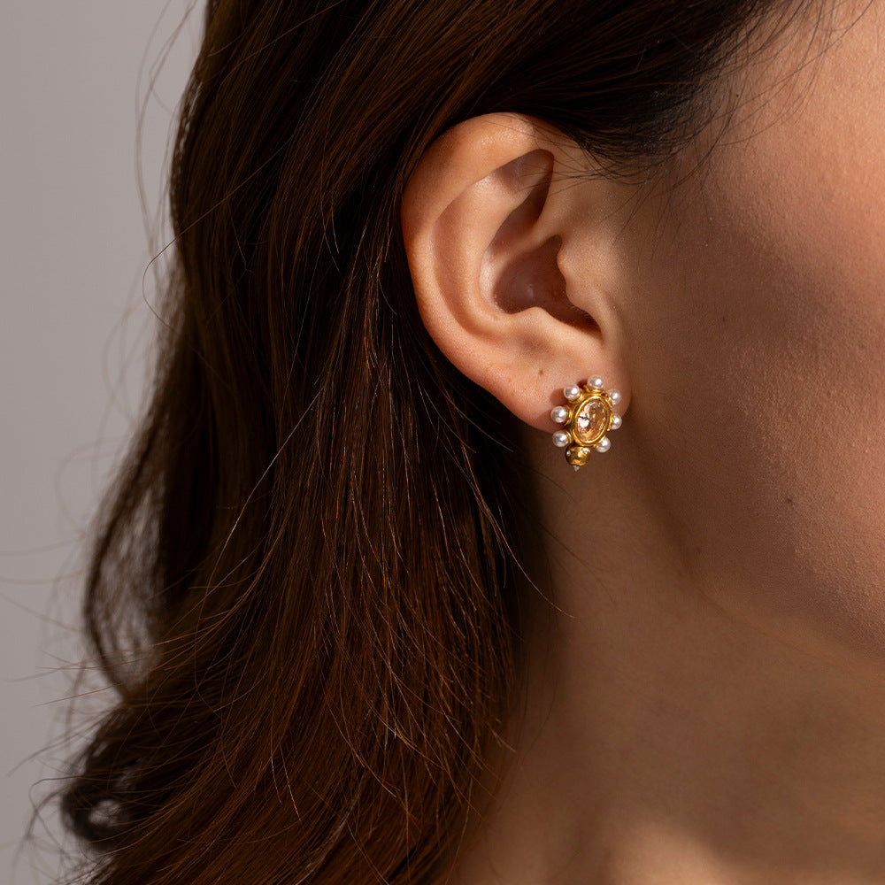 Elegante oorbellen van goud met parel