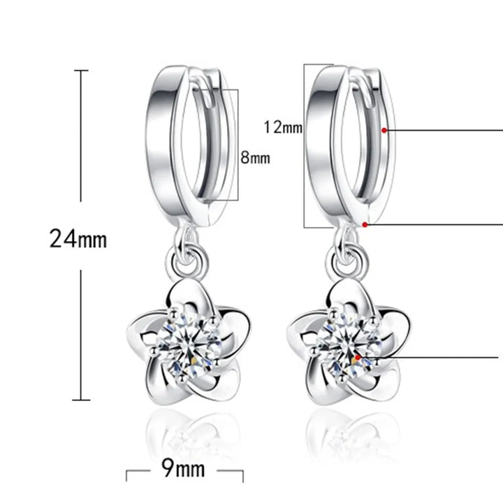 Oorbellen van sterling zilver met paarse en witte zirkonia