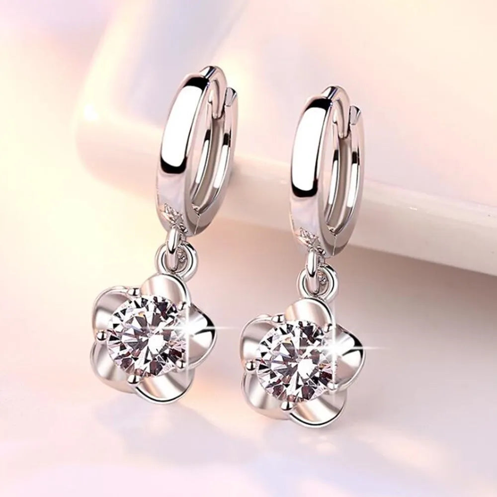 Oorbellen van sterling zilver met paarse en witte zirkonia