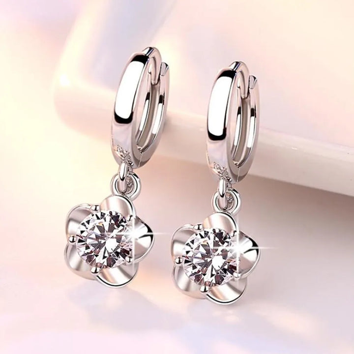 Oorbellen van sterling zilver met paarse en witte zirkonia