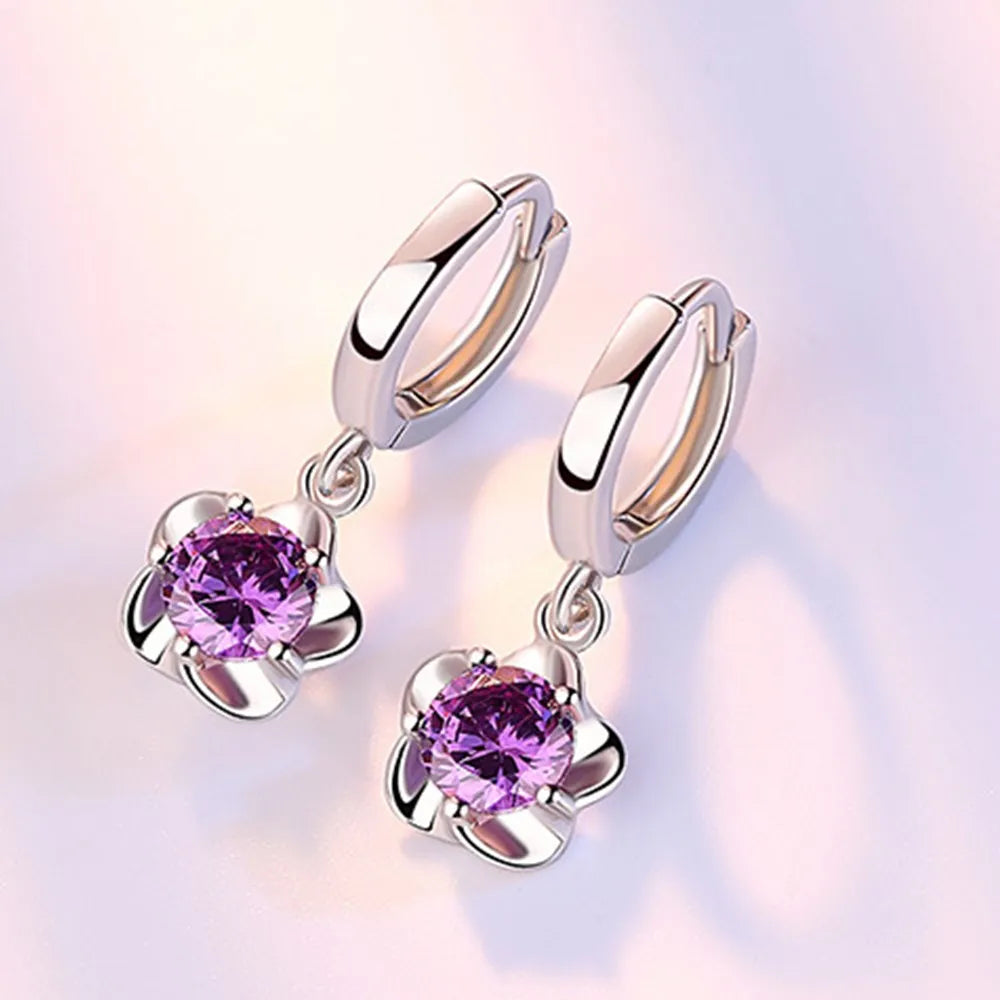 Oorbellen van sterling zilver met paarse en witte zirkonia
