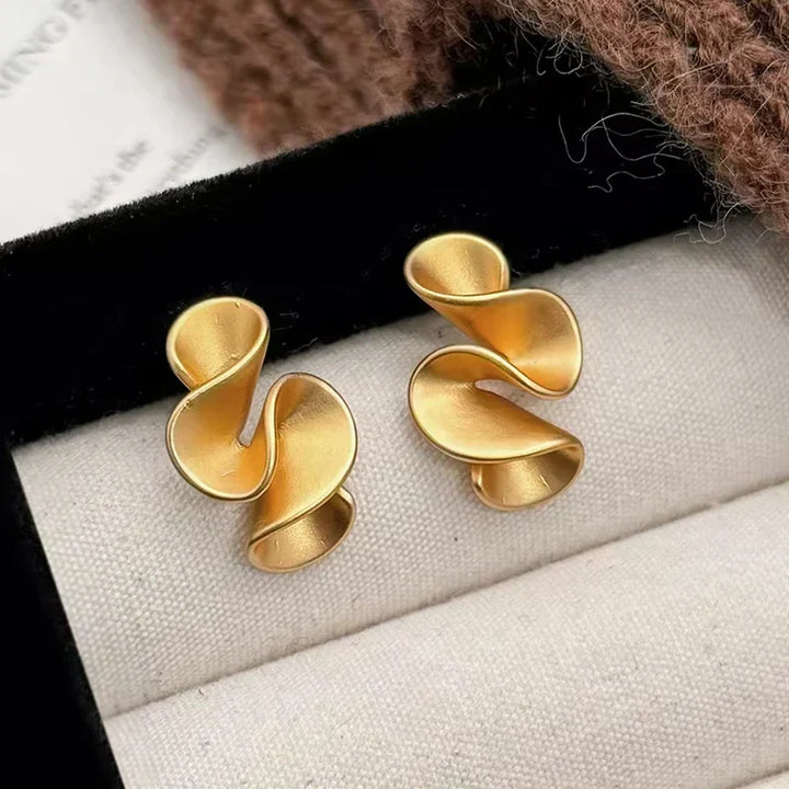 Bloemenoorbellen van Zilver en 18K Goud