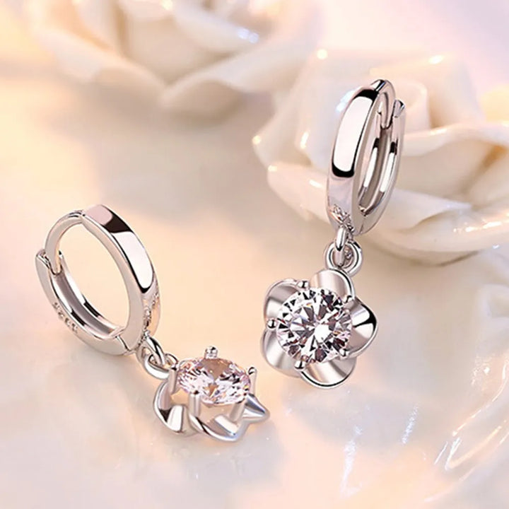 Oorbellen van sterling zilver met paarse en witte zirkonia