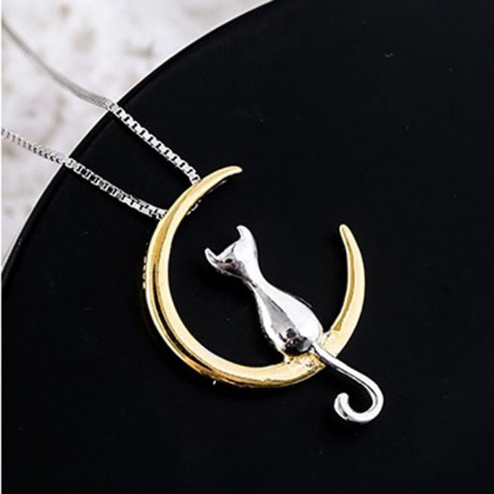 Elegante halsketting met halve maan en kat