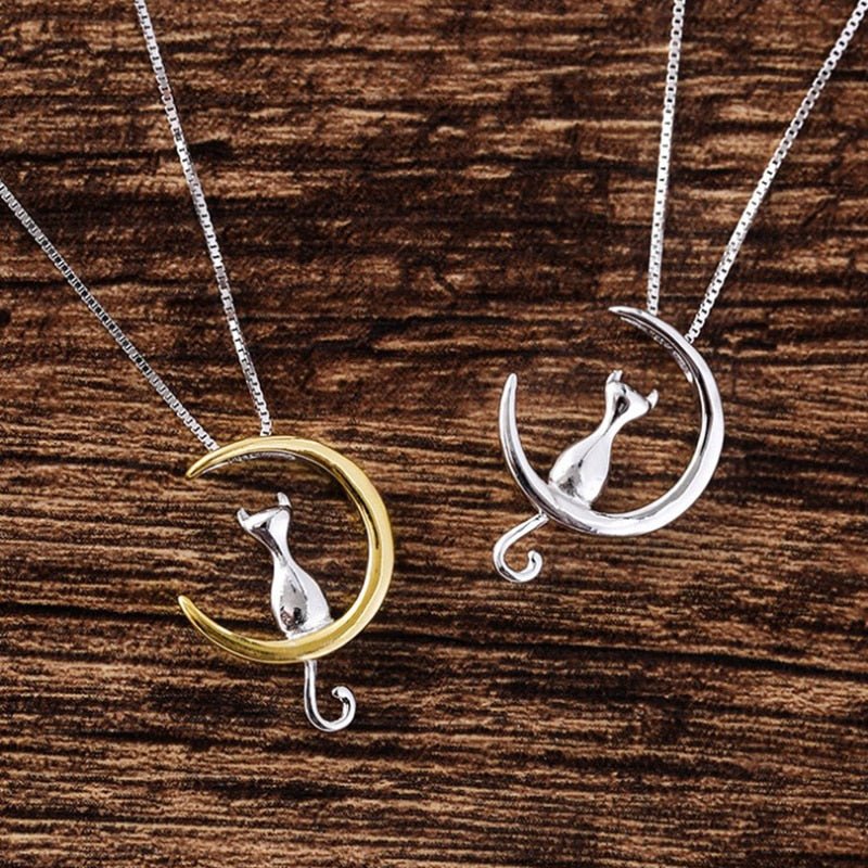 Elegante halsketting met halve maan en kat