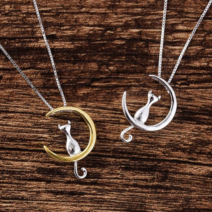 Elegante halsketting met halve maan en kat