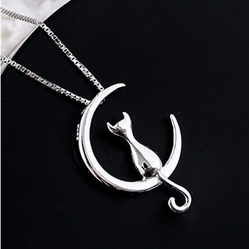 Elegante halsketting met halve maan en kat