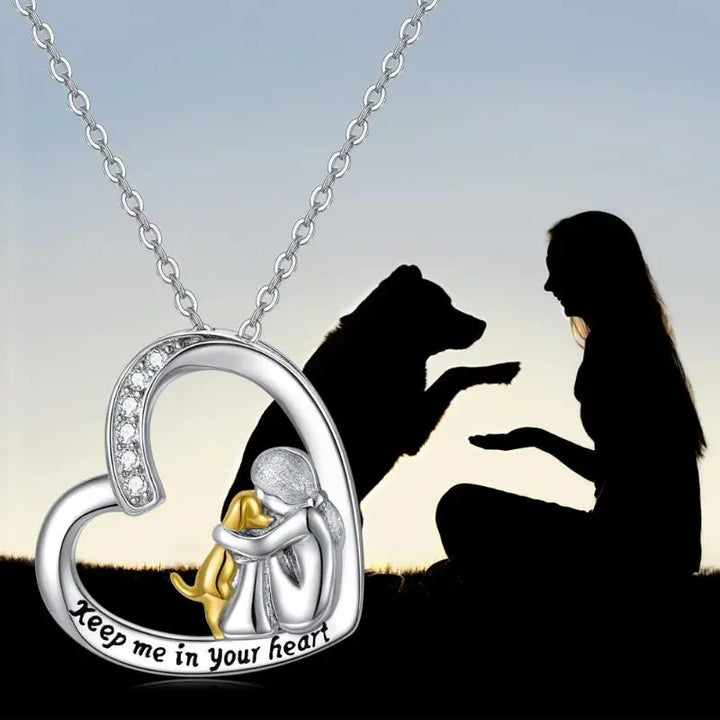 Zilveren ketting met hartje met hond en zirkonia steentjes