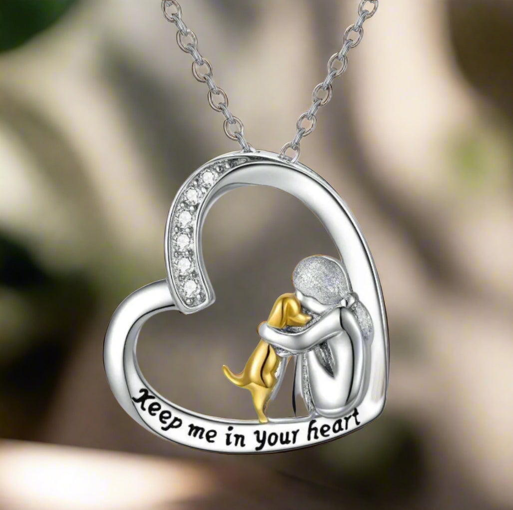 Zilveren ketting met hartje met hond en zirkonia steentjes